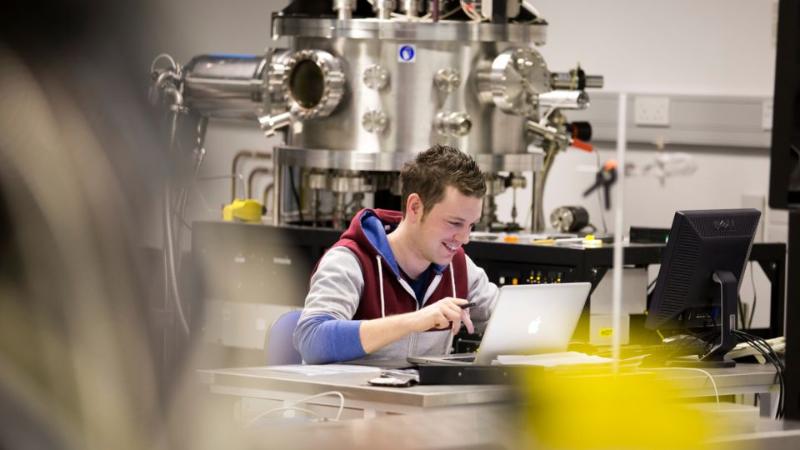 student working in a workshop environment